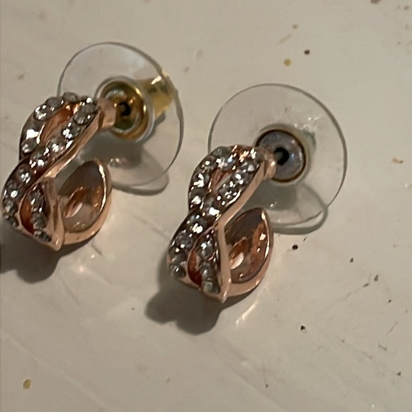 1” rose gold tone infinity stud earrings with 18 prong set crystals - Picture 6 of 16